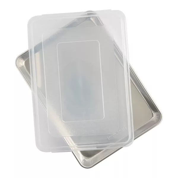Photo 1 of **USED BECAUSE DENT IN BOTTOM OF DISH**
Nordic Ware 9"x13" Aluminum Pan with Lid Silver: Rectangle Bakeware Set, Hand Wash, Oven-Safe, Lifetime Warranty
