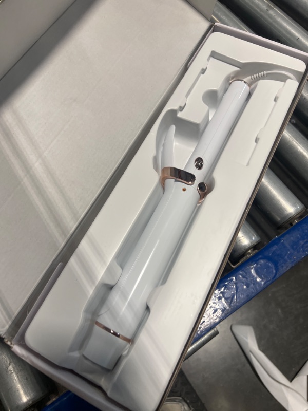 Photo 1 of T3 SinglePass Curl X Extra-Long Barrel Curling Iron with 9 Heat Settings and Ceramic Barrel for Fast Styling and Lasting Results on All Hair Types