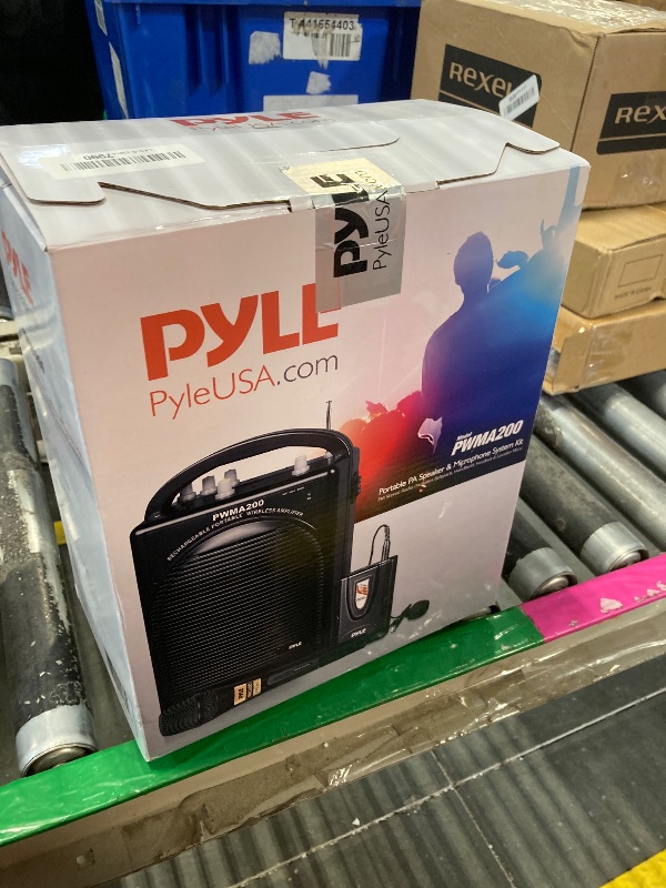Photo 1 of **FACTORY SEALED AS SHOWN IN PHOTO**Pyle Portable PA Speaker & Microphone System - FM Stereo Radio, Built-in Rechargeable Battery, Aux & Microphone Inputs, Includes Beltpack, Hand-held Headset & Lavalier Mics - Black