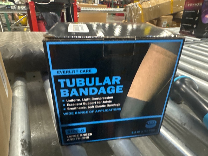 Photo 1 of EVERLIT Elasticated Tubular Support Bandage | Stockinette Tubing for Large Arm, Knees, Legs | Light to Moderate Compression Bandage Roll for Tissue Support (Size G | 4.5" x 11 yd)