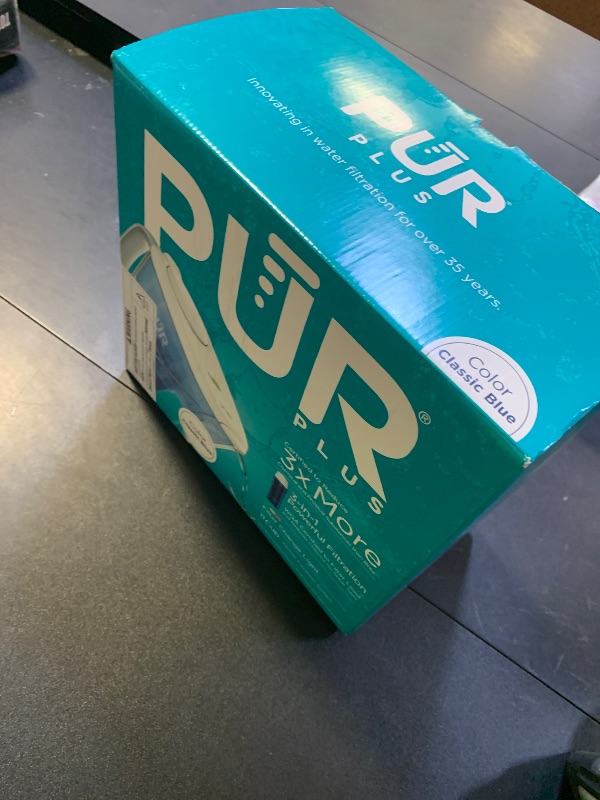 Photo 1 of PUR Plus 11-Cup Water Pitcher, 1 Lead-Reducing Filter, Cleaner, Great-tasting Water, Dishwasher Safe, Powerful Filtration, Filter Change Light Indicator, LockFit Cap Design - White