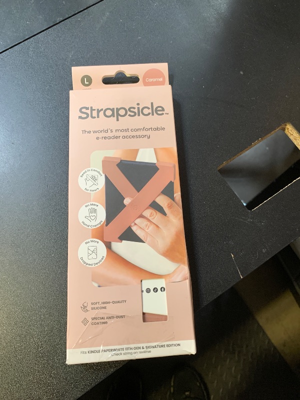Photo 1 of Strapsicle Kindle E-Reader Holder, Portable Electronic Device Cover, Compatible with Kindle Paperwhite 2021 & 2023, Game-Changer for Comfortable Reading Experience