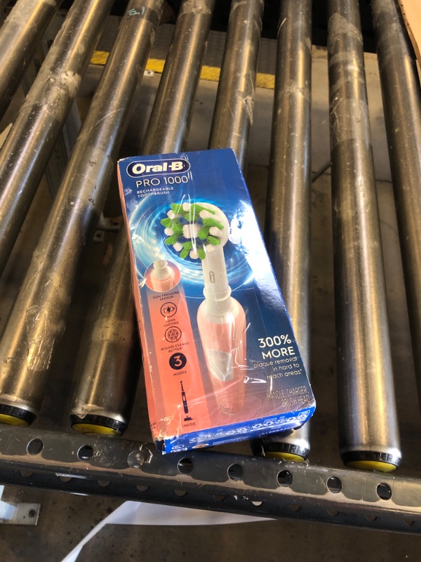 Photo 1 of Oral-B Pro 1000 Rechargeable Electric Toothbrush, Pink