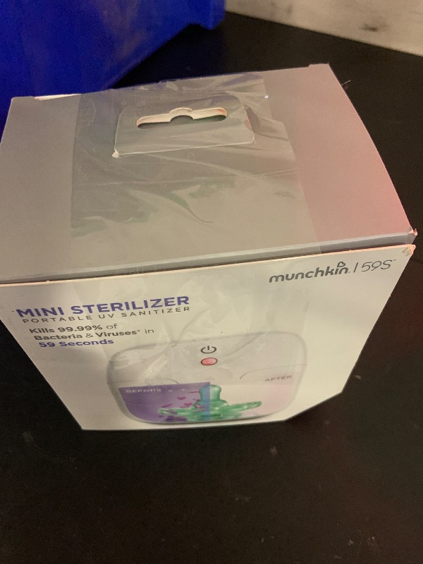 Photo 1 of Munchkin Portable UV-C Cleaner for Pacifiers, Teethers and More, White