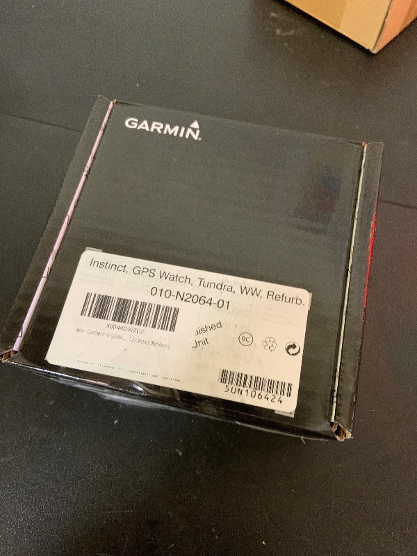 Photo 1 of Garmin 010-02064-01 Instinct, Rugged Outdoor Watch with GPS, Features GLONASS and Galileo, Heart Rate Monitoring and 3-axis Compass, Tundra, 1.27 inches (Renewed)