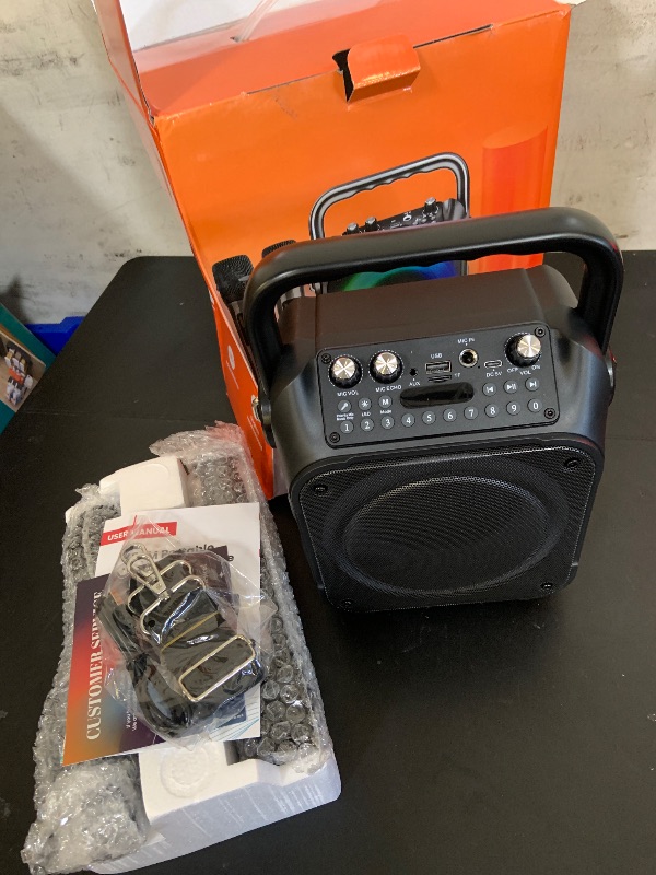 Photo 1 of Karaoke Machine, Portable Bluetooth Speaker with 2 Wireless Microphones for Adults & Kids with Lights, Karaoke Microphone with PA System Supports USB/TF/REC/FM/AUX for Home Party Home System Packages