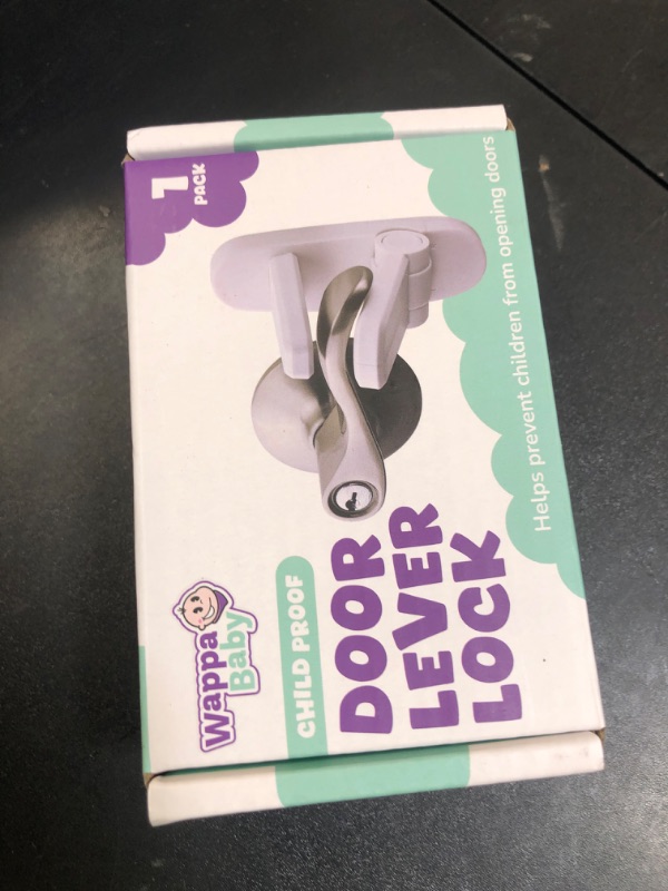 Photo 1 of Door Lever Lock (1 Pack) Prevents Toddlers from Opening Doors. 3.25" L * 1.5" W * 4.5" H Easy One Hand Operation for Adults. Durable ABS with 3M Adhesive Backing. Simple Install, No Tools Needed.