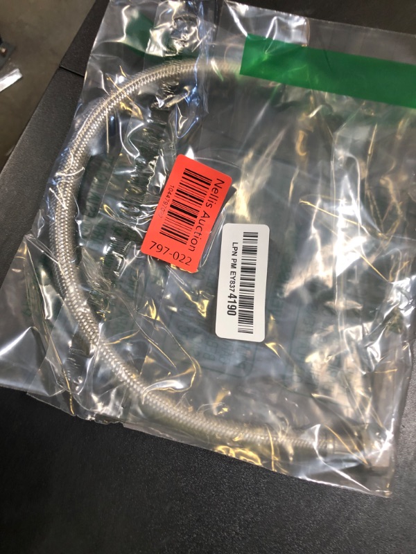 Photo 1 of Eastman 16 Inch Steel-Flex Faucet Connector, Braided Stainless Steel Supply Line with 1/2 In. FIP Ends, 48016