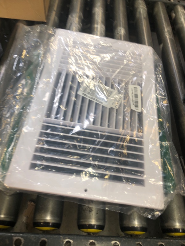 Photo 1 of Three-way plastic side wall/ceiling register in white 14"w X 8"h for duct opening (outside dimension is 15.75"w X 10"h)