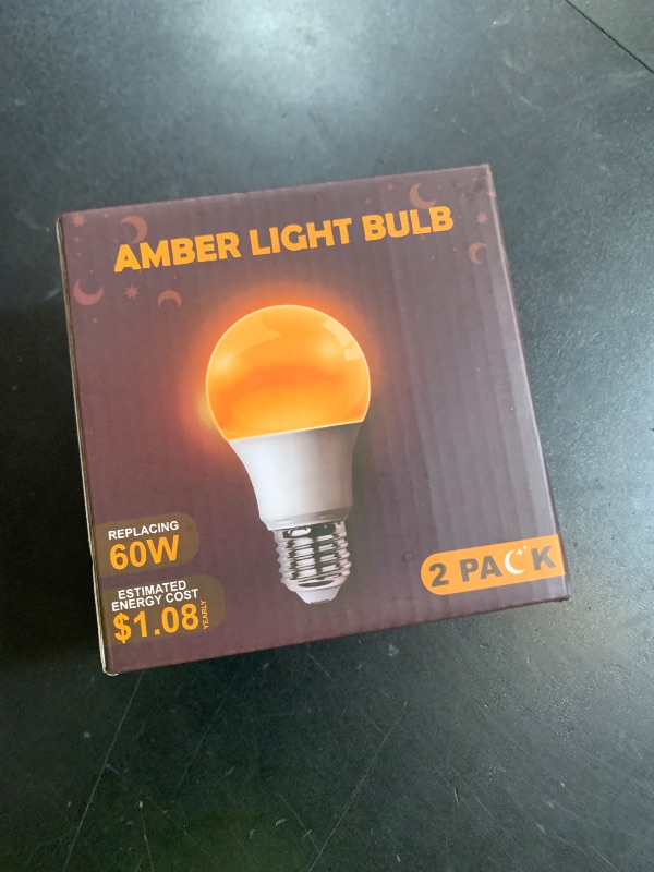 Photo 1 of DALUXshop Amber Sleep Light Bulbs, Blue Light Blocking, A19 9W(60 Watt Equivalent) Dim Light Bulbs for Lamp, 1800K Warm Light Bulb, E26 for Healthy Sleep, Bedroom, Kids Room, 2 Pack