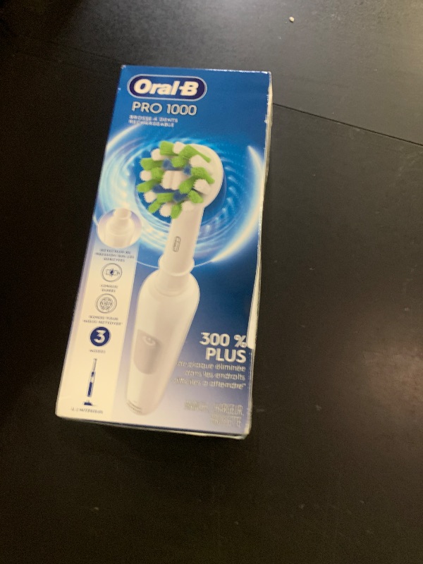 Photo 1 of Oral-B Pro 1000 Rechargeable Electric Toothbrush, White