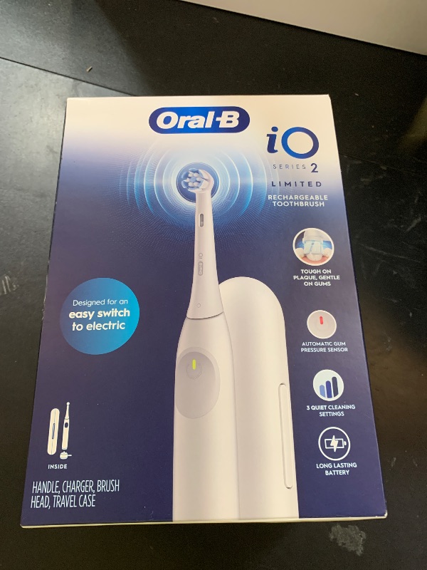 Photo 1 of Oral-B iO Simple Clean Rechargeable Electric Powered Toothbrush, Pure White with 1 Gentle Care Brush Head and 1 White Travel Case - Automatic Pressure Sensor to Protect Gums - 3 Modes -2 Min Timer