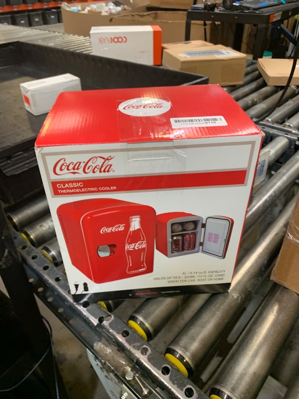 Photo 1 of Coca-Cola Classic Coke Bottle 4L Mini Fridge w/ 12V DC and 110V AC Cords, 6 Can Portable Cooler, Personal Travel Refrigerator for Snacks Lunch Drinks Cosmetics, Desk Home Office Dorm, Red