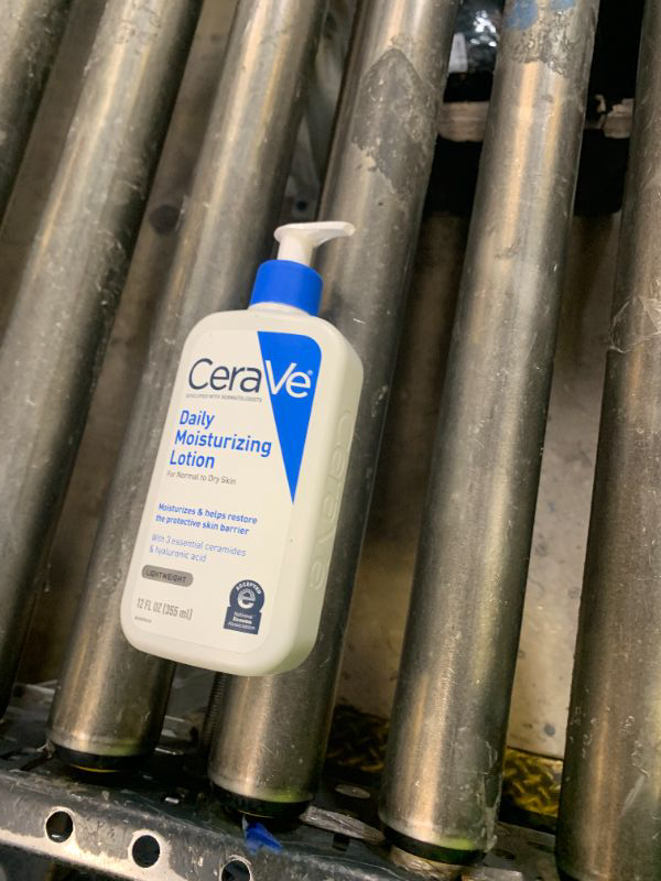 Photo 1 of CeraVe Daily Moisturizing Lotion for Dry Skin, Body Lotion & Face Moisturizer with Hyaluronic Acid and Ceramides, Daily Moisturizer, Fragrance Free, Oil-Free, 12 Ounce