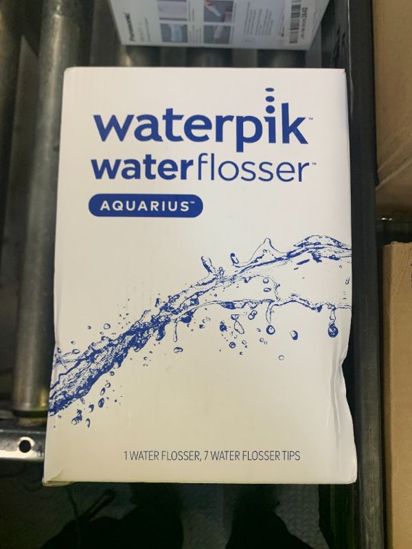 Photo 1 of Waterpik Aquarius Water Flosser For Teeth Cleaning, Gums, Braces, Dental Care, Electric Power With 10 Settings, 7 Tips For Multiple Users And Needs, ADA Accepted, Blue WP-663, Packaging May Vary