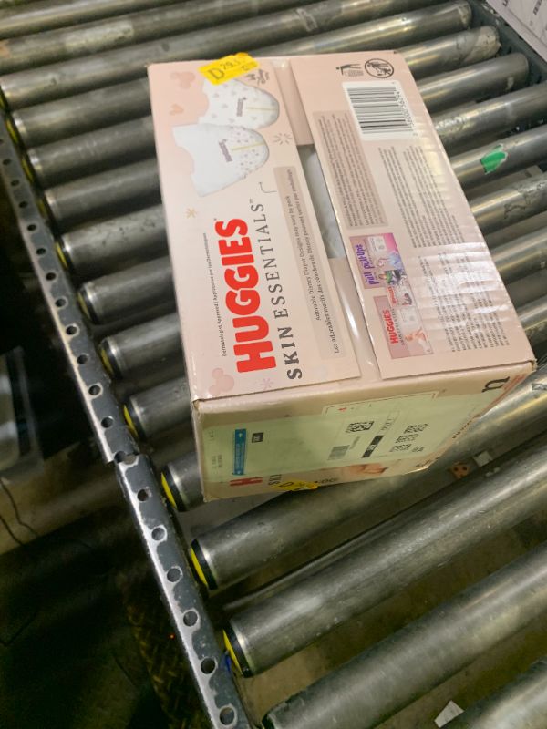 Photo 1 of Huggies Size Newborn Diapers, Skin Essentials Baby Diapers, Size Newborn (6-9 lbs), 76 Count, Packaging May Vary