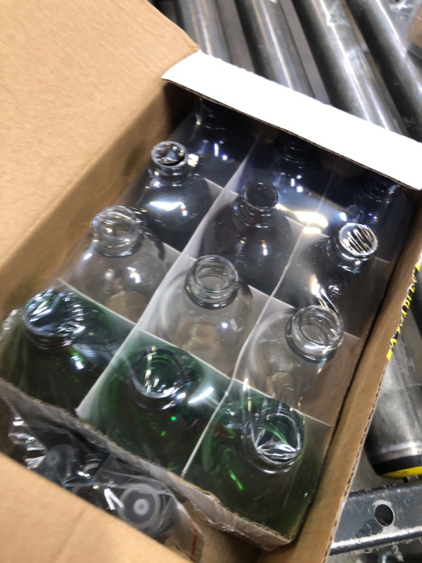 Photo 1 of 4oz GLASS BOTTLES WITH LID 