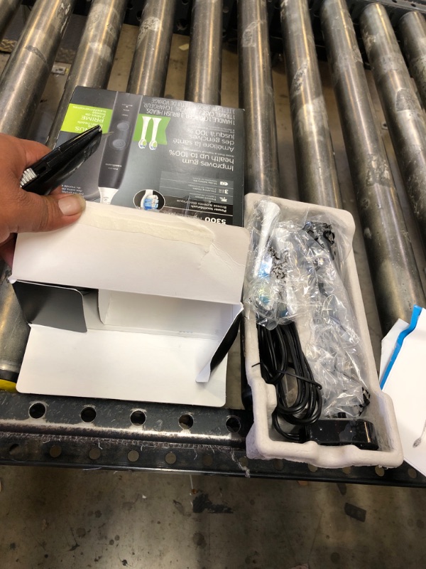 Photo 1 of Philips Sonicare ProtectiveClean 5300 Rechargeable Electric Toothbrush, with Pressure Sensor, 3 Cleaning Modes, SmarTimer and QuadPacer, with 2 Bonus Brush Heads, Travel Case, Black, Model HX6423/34