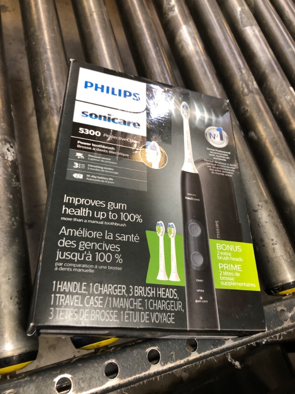 Photo 1 of Philips Sonicare ProtectiveClean 5300 Rechargeable Electric Toothbrush, with Pressure Sensor, 3 Cleaning Modes, SmarTimer and QuadPacer, with 2 Bonus Brush Heads, Travel Case, Black, Model HX6423/34