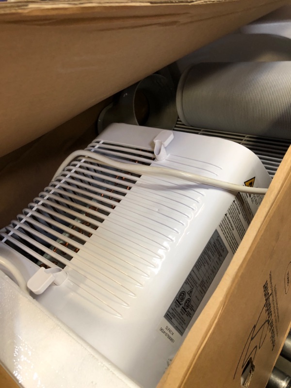 Photo 1 of SereneLife Small Air Conditioner Portable 14,000 BTU with Built-in Dehumidifier - Portable AC unit for rooms up to 650 sq ft - Remote Control, Window Mount Exhaust Kit