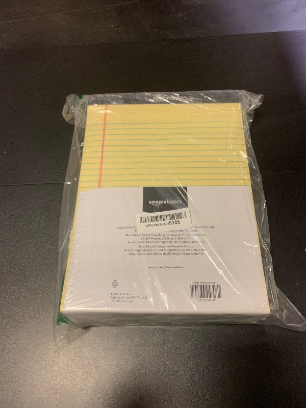 Photo 1 of Amazon Basics 50 sheet Wide Ruled Lined Writing Note Pad, 8.5" x 11.75", 12-Pack, 600 Perforated Sheets, Canary