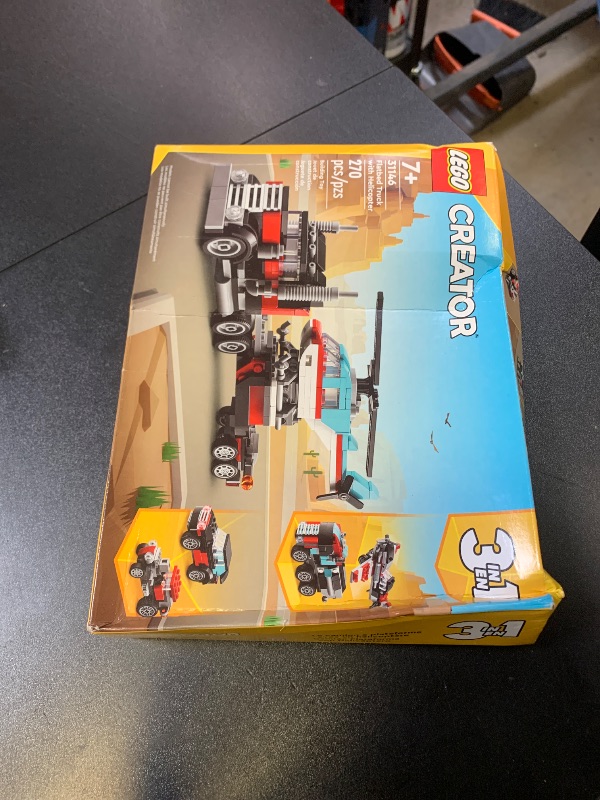 Photo 1 of LEGO Creator 3 in 1 Flatbed Truck with Helicopter Toy, Transforms from Flatbed Truck Toy to Propeller Plane to Hot Rod and SUV Car Toys, Gift Idea for Boys and Girls Ages 7 Years Old and Up, 31146