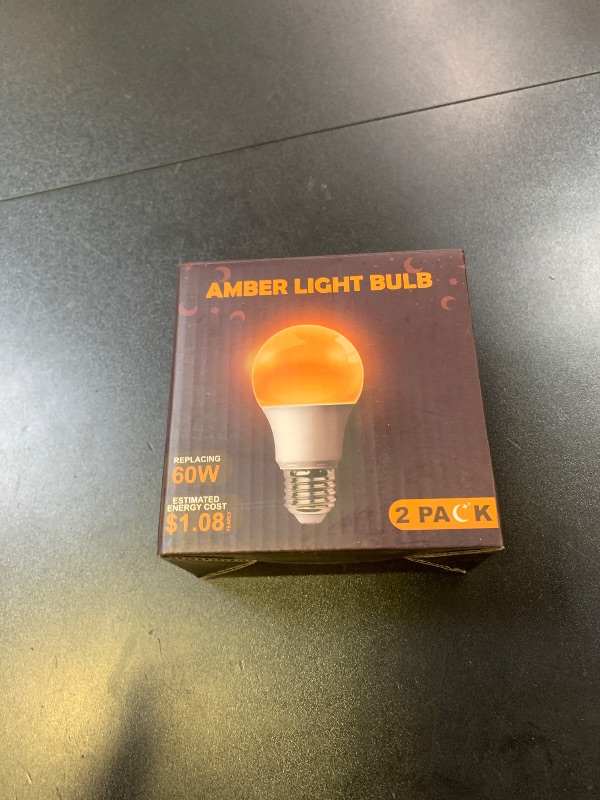 Photo 1 of DALUXshop Amber Sleep Light Bulbs, Blue Light Blocking, A19 9W(60 Watt Equivalent) Dim Light Bulbs for Lamp, 1800K Warm Light Bulb, E26 for Healthy Sleep, Bedroom, Kids Room, 2 Pack