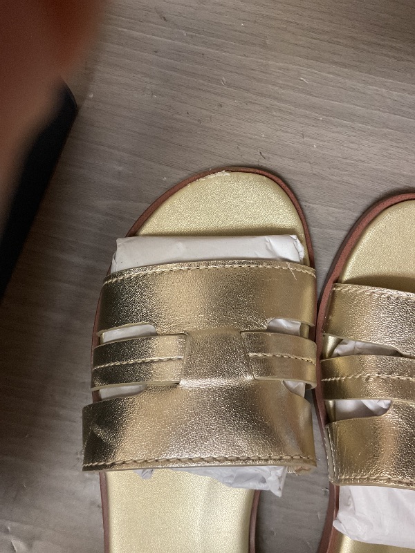Photo 1 of Cole Haan Women's Flynn Slotted Slides Sandal, Soft Gold LTR, 7.5