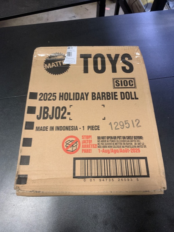 Photo 1 of Barbie Signature 2025 Holiday Dark Brown Hair Fashion Doll Wearing Silver & Gold Gown, Seasonal Collector in Displayable Packaging & Stand