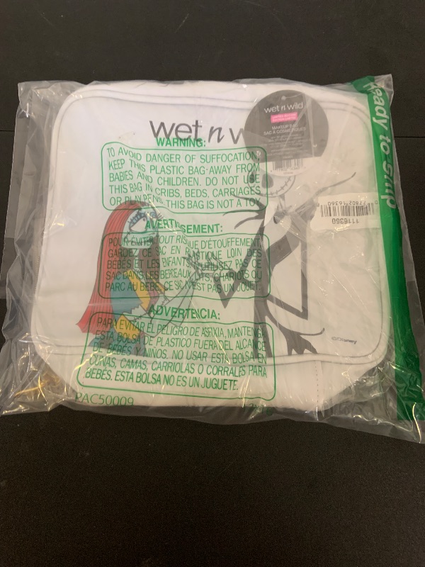 Photo 1 of wet n wild Nightmare Before Christmas Makeup Bag - Full-Zip Closure with Bat Charms, Dual-Compartment Interior, Portable Travel Case Inspired by Disney’s Iconic Film, Cruelty-Free - Jack & Sally