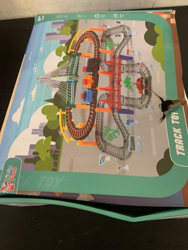 Photo 1 of Electric Toddler Train Set Toy, Battery Powered Railway Train Track Toy Playset for Kids Ages 3 4 5, Boys and Girls