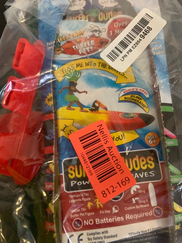 Photo 1 of Surfer Dudes Legends & Surfer Pets Wave Powered Mini-Surfer, Pet and Surfboard Beach Toy - Teahupo'o Tiki and Toucan Tiki