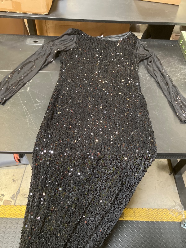 Photo 1 of WOMENS MAXI DRESS
SIZE MEDIUM