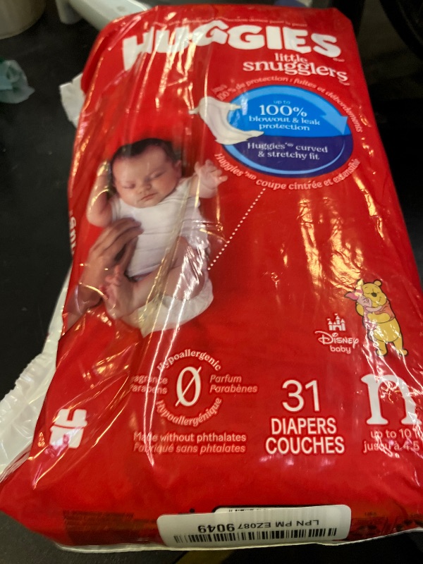 Photo 1 of Huggies Size Newborn Diapers, Little Snugglers Baby Diapers, Size Newborn (up to 10 lbs), 31 Count, Packaging May Vary