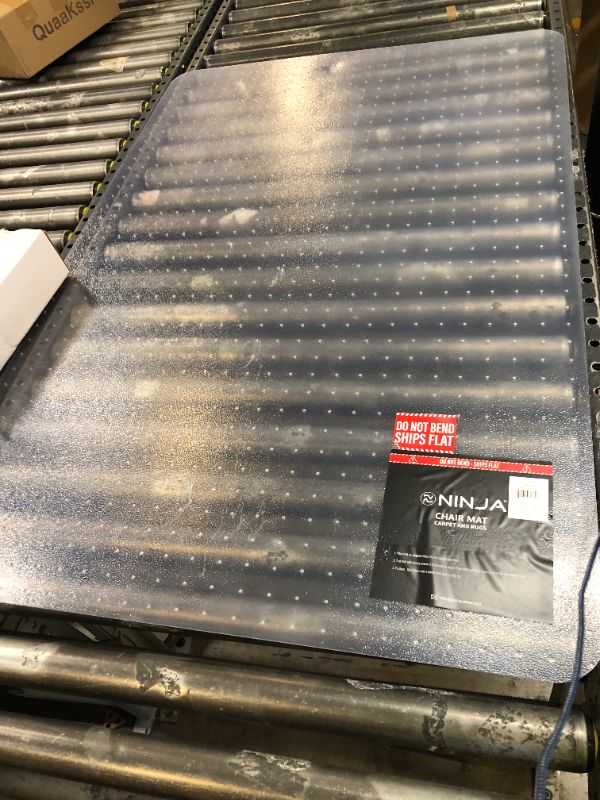 Photo 1 of NINJA Easy Glide Office Chair Mat for Carpet Floors, Strong Slip Resistant Under Desk Floor Protector, Stay in Place Plastic Computer Mats for Rolling Work and Gaming Chairs, 32.5x48 Inch, Clear