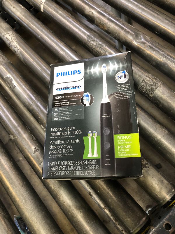 Photo 1 of Philips Sonicare ProtectiveClean 5300 Rechargeable Electric Toothbrush, with Pressure Sensor, 3 Cleaning Modes, SmarTimer and QuadPacer, with 2 Bonus Brush Heads, Travel Case, Black, Model HX6423/34