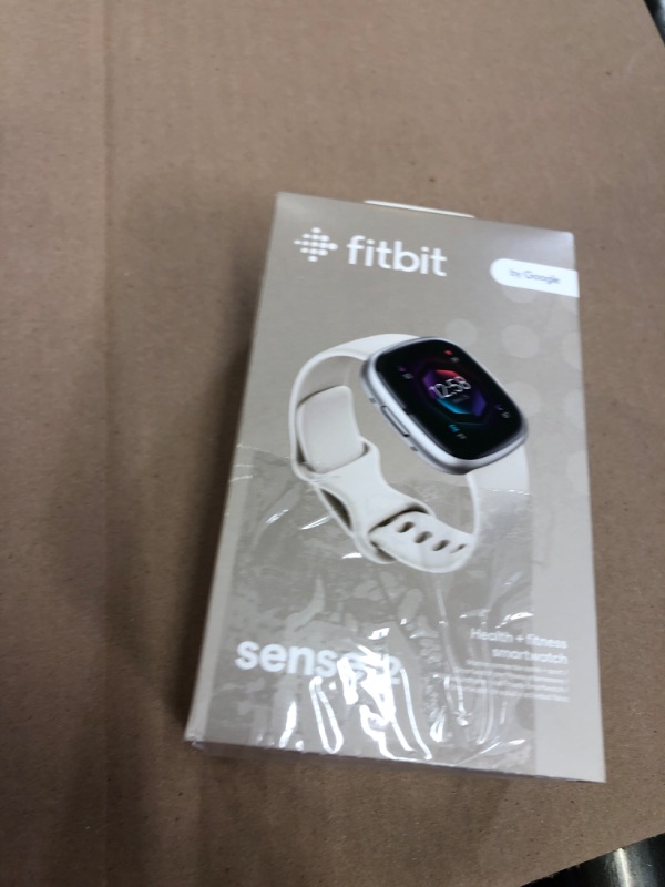 Photo 1 of Fitbit Sense 2 Advanced Health and Fitness Smartwatch with Tools to Manage Stress and Sleep, ECG App, SpO2, 24/7 Heart Rate and GPS, Lunar White/Platinum, One Size (S & L Bands Included)