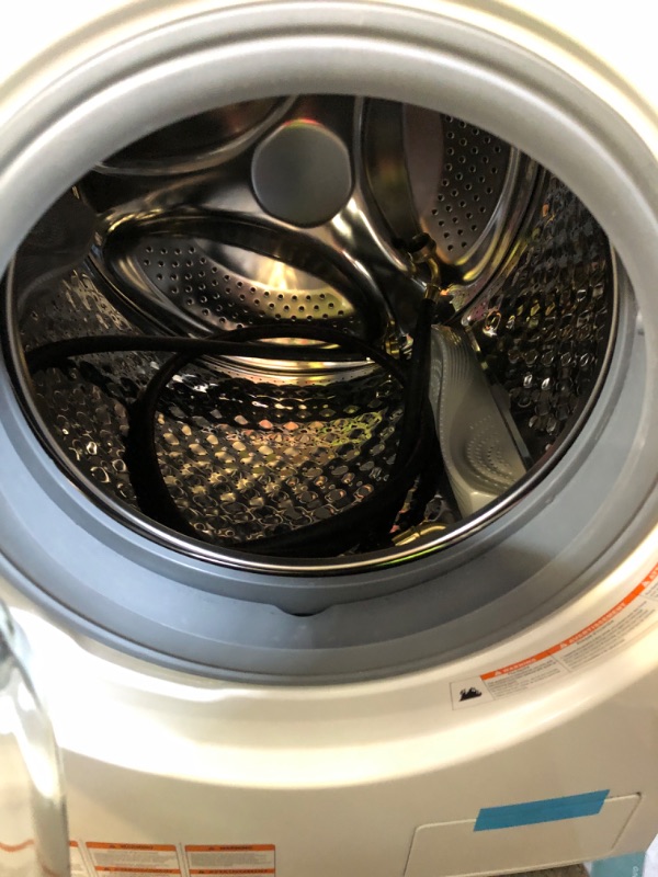 Photo 1 of COMFEE’ 24" Washer and Dryer Combo 2.7 cu.ft 26lbs Washing Machine Steam Care, Overnight Dry, No Shaking Front Load Full-Automatic Machine, Dorm White