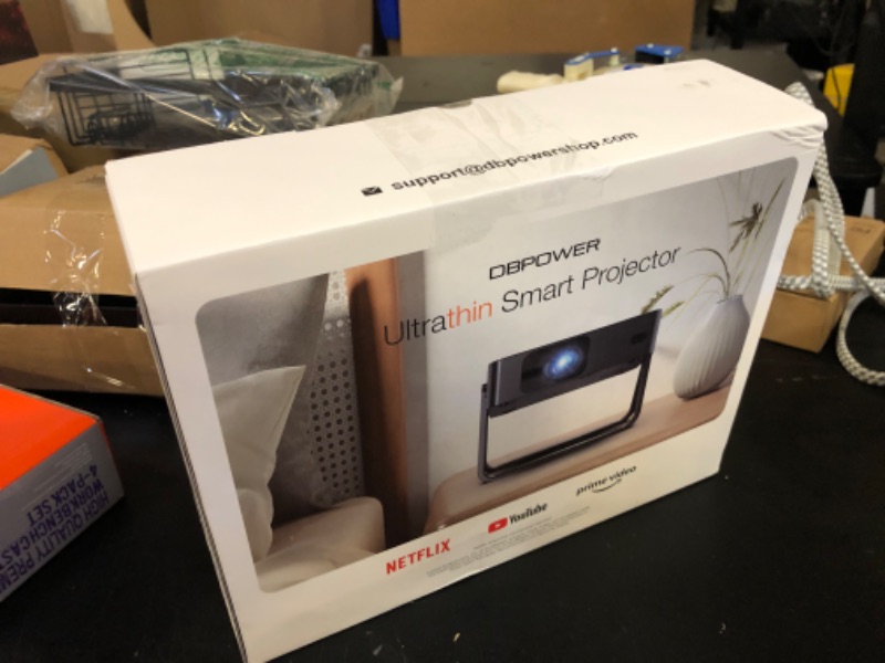 Photo 1 of [Ultra-Slim 1.97"| Netflix Licensed | AI Auto Focus | 360° Stand] Smart Mini Projector with WiFi 6 & Bluetooth, Built-in Netflix/YouTube/Disney+/Hulu, DBPOWER N5 Movie Projector for Bedroom (Black)