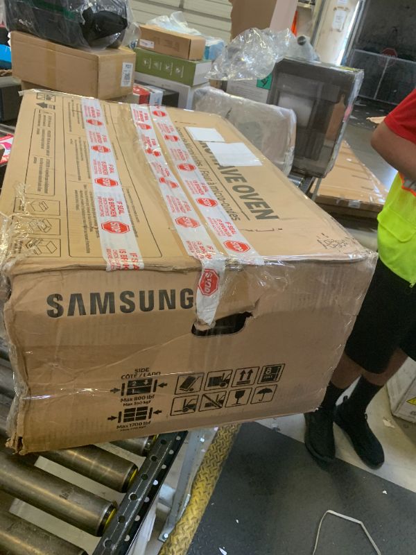 Photo 1 of SAMSUNG 1.1 Cu Ft Smart SLIM Over the Range Microwave Oven w/ 550 CFM Hood Vent, Wi-Fi, Voice Control, LED Light Bar, Sensor Cook, 1100 Watt, ME11A7710DS/AA, Fingerprint Resistant Stainless Steel