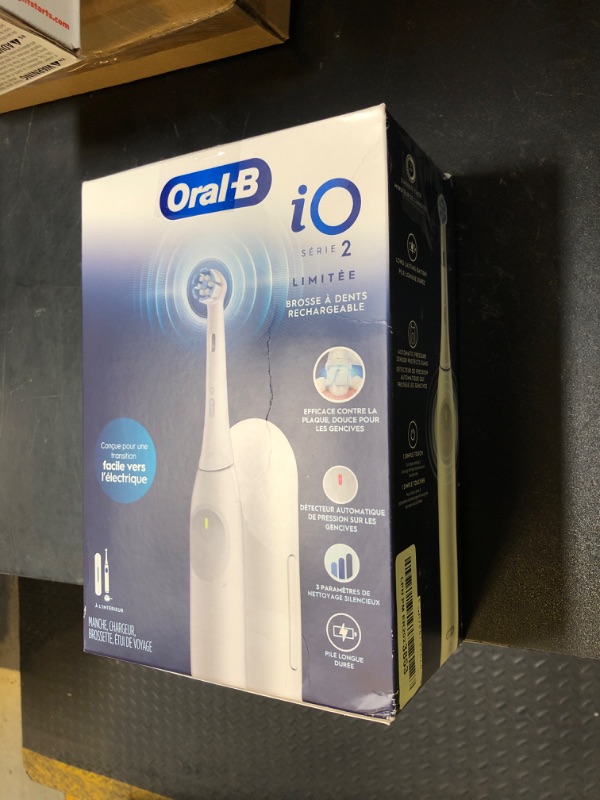 Photo 1 of Oral-B iO Simple Clean Rechargeable Electric Powered Toothbrush, Pure White with 1 Gentle Care Brush Head and 1 White Travel Case - Automatic Pressure Sensor to Protect Gums - 3 Modes -2 Min Timer