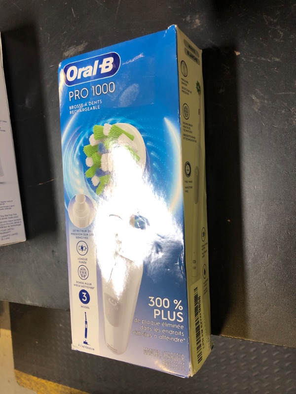 Photo 1 of Oral-B Pro 1000 Rechargeable Electric Toothbrush, White