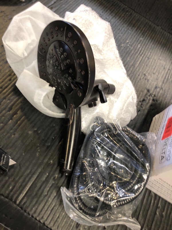 Photo 1 of Delta 4-Setting In2ition 2-in-1 Dual Shower Head with HandHeld Spray, Venetian Bronze Detachable Shower Head with Hose, Showerhead, 1.75 GPM Flow Rate, Venetian Bronze 58499-RB