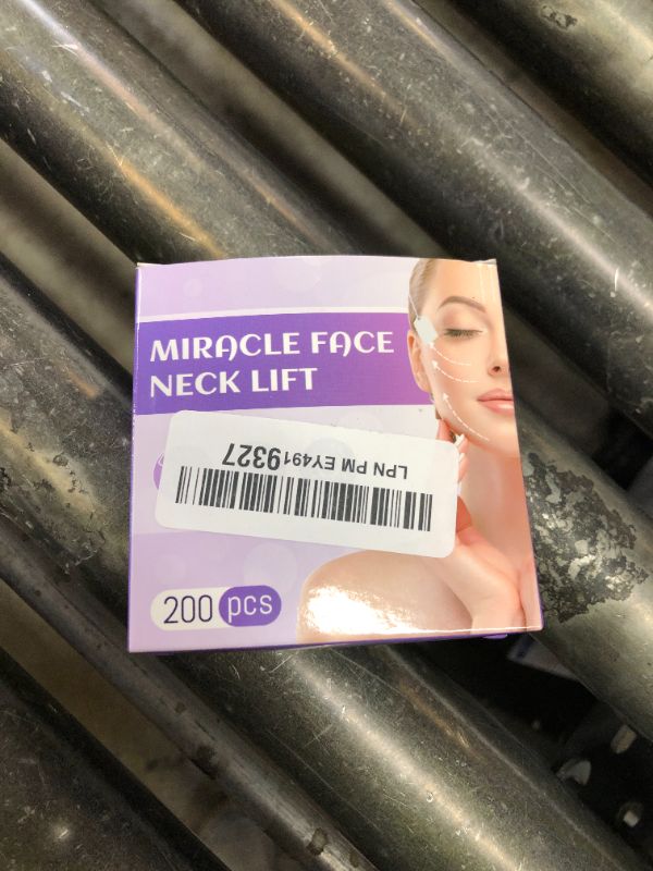 Photo 1 of MUOCOBU Face Lift Tape 200PCS Bands Instant Facelift Tape for Wrinkles, Double Chin, and Sagging Skin Waterproof & Transparent Lifting Tapes with Elastic Bands (200PCS)