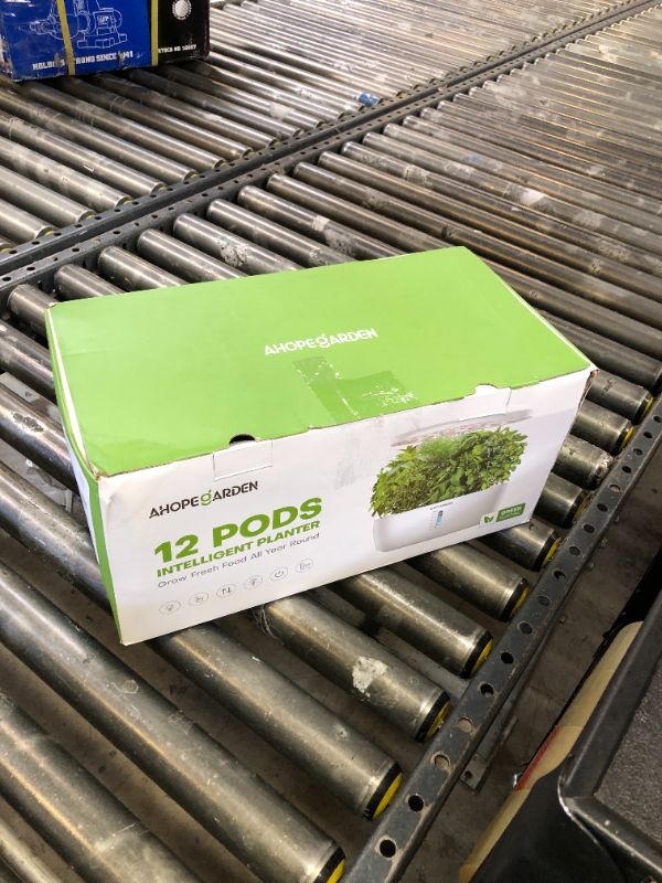 Photo 1 of Ahopegarden Indoor Garden Hydroponics Growing System: 12 Pods Plant Germination Kit Herb Garden Kit Growth Lamp Countertop with LED Grow Light Hydrophonic Planter Grower Harvest Vegetable Lettuce
