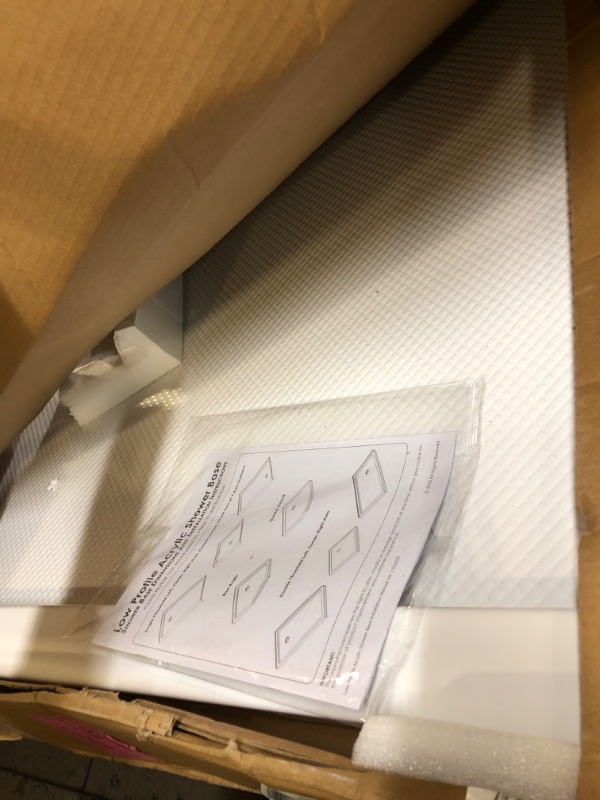 Photo 1 of DreamLine SlimLine 32 in. D x 42 in. W x 2 3/4 in. H Center Drain Single Threshold Shower Base in White, DLT-1132420