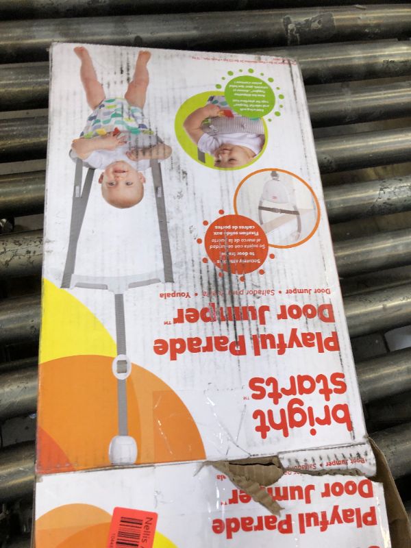 Photo 1 of Bright Starts Playful Parade Door Jumper for Baby with Adjustable Strap, 6 Months and Up, Max Weight 26 lbs