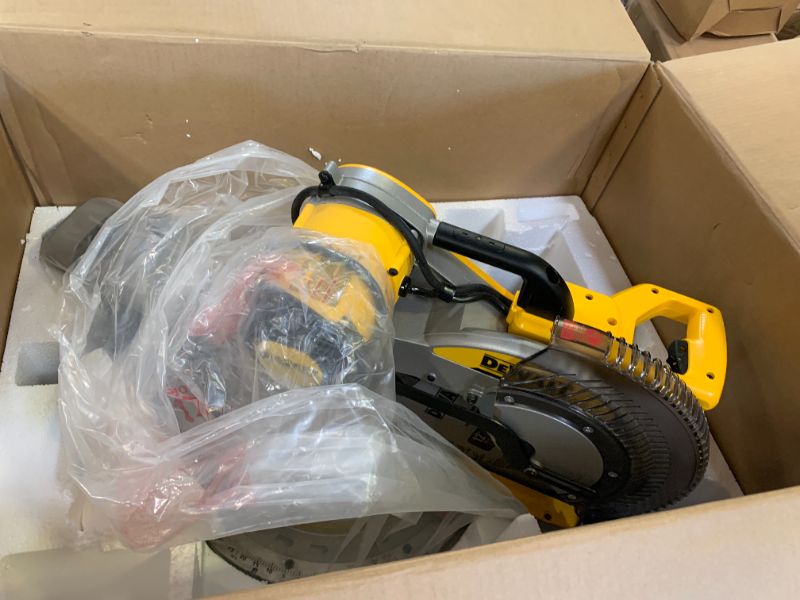 Photo 1 of DEWALT Sliding Compound Miter Saw, 12-Inch (DWS779)