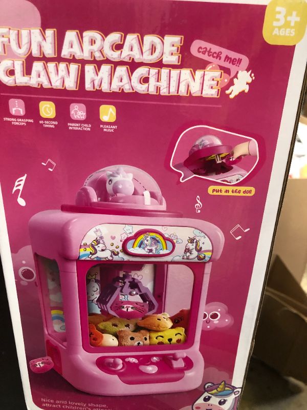 Photo 1 of TingingYuli Claw Machine for Kids,Unicorn Mini Vending Machines Candy Grabber Prize Dispenser Toys for Girls,Electronic Arcade Game with 20 Mini Plush Toys for Christmas Easter Birthday Gifts
