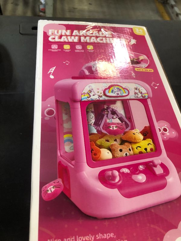 Photo 1 of TingingYuli Claw Machine for Kids,Unicorn Mini Vending Machines Candy Grabber Prize Dispenser Toys for Girls,Electronic Arcade Game with 20 Mini Plush Toys for Christmas Easter Birthday Gifts